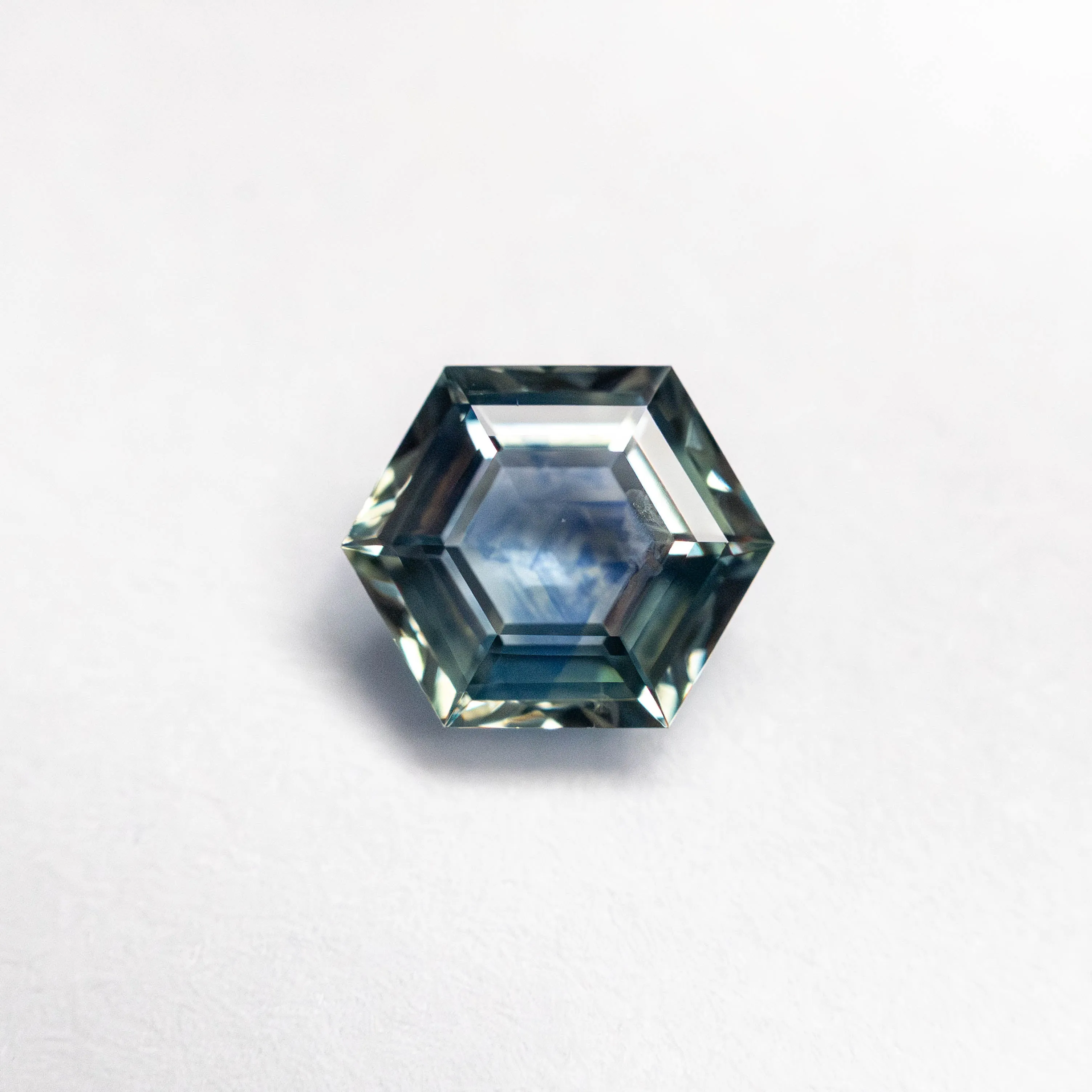 0.87ct 6.57x5.52x2.77mm Hexagon Step Cut Sapphire 23088-10